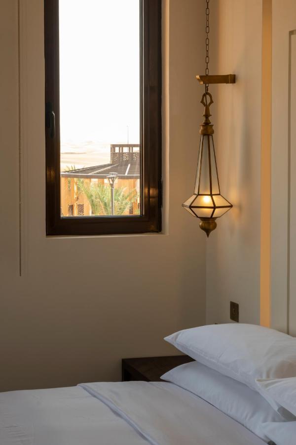 Al Badayer Retreat By Sharjah Collection Hotell Margham Eksteriør bilde A hanging lamp